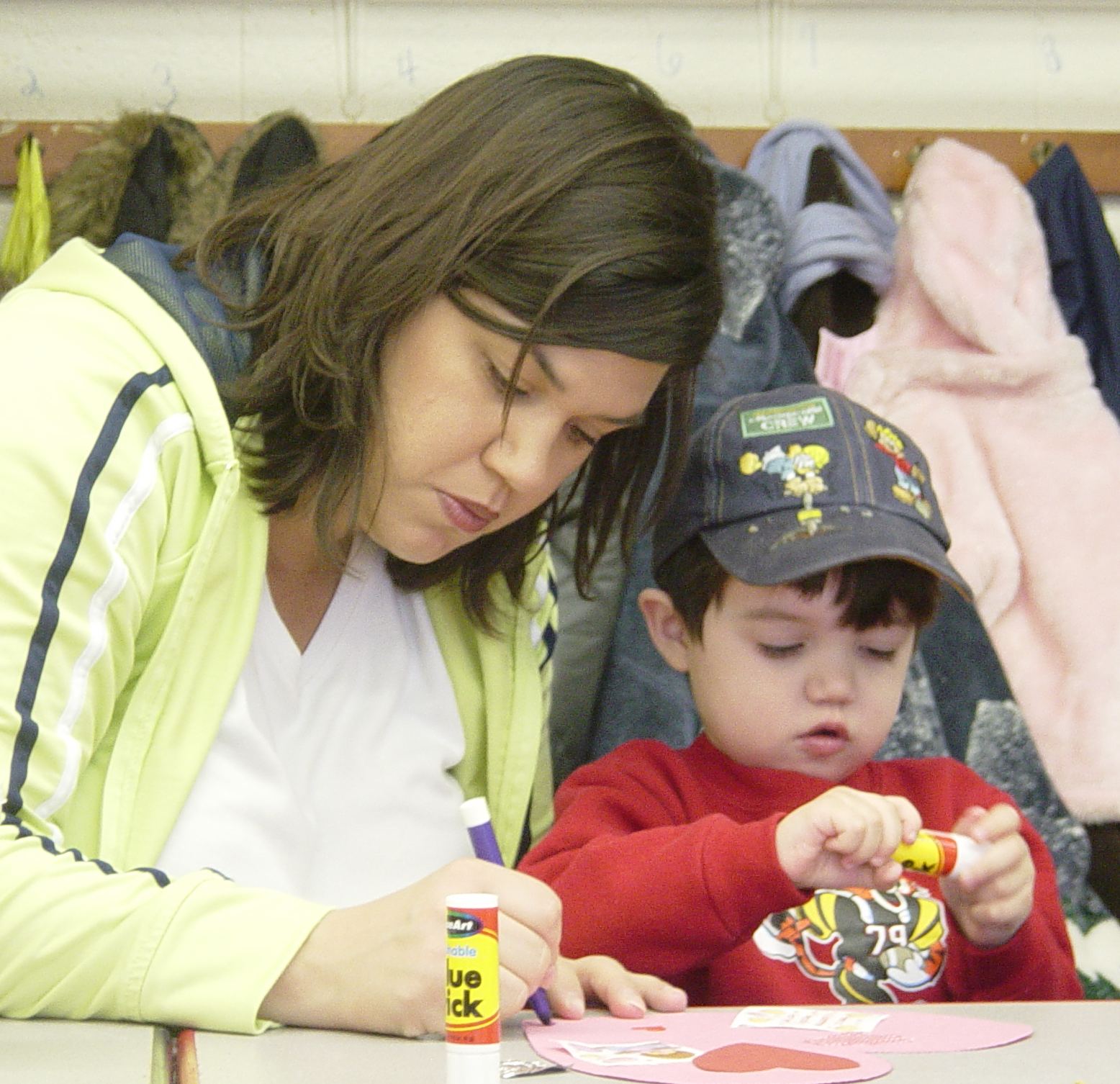 Mom coloring with small child